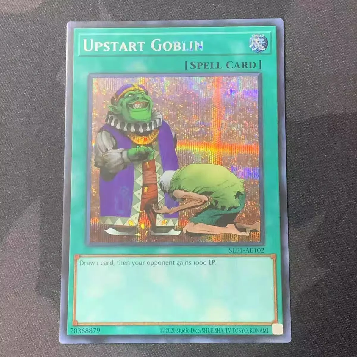 

Yugioh KONAMI Duel Monsters SLF1-AE102 Upstart Goblin Secret Rare Asian English Collection Mint Card