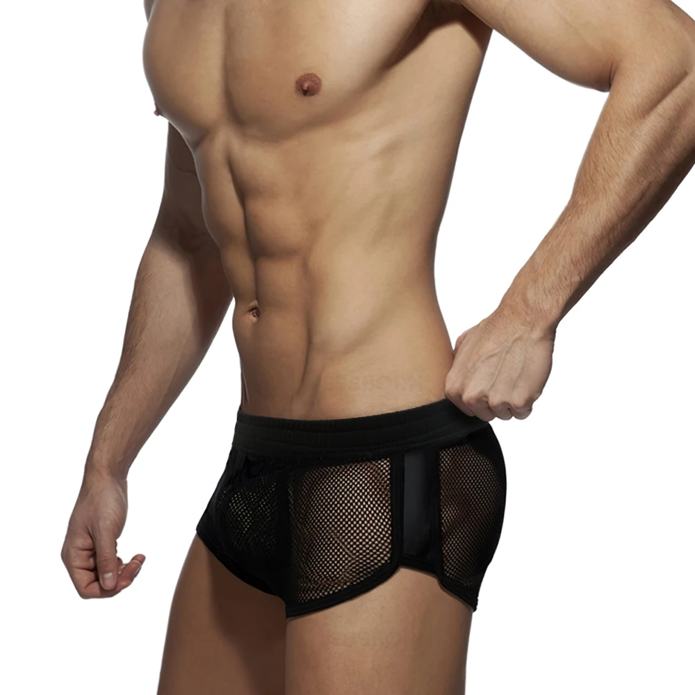 Calzoncillos transparentes de malla fina para hombre, ropa de dormir Sexy para el hogar, pantalones de salón, pijama de poliéster convexo con bolsa