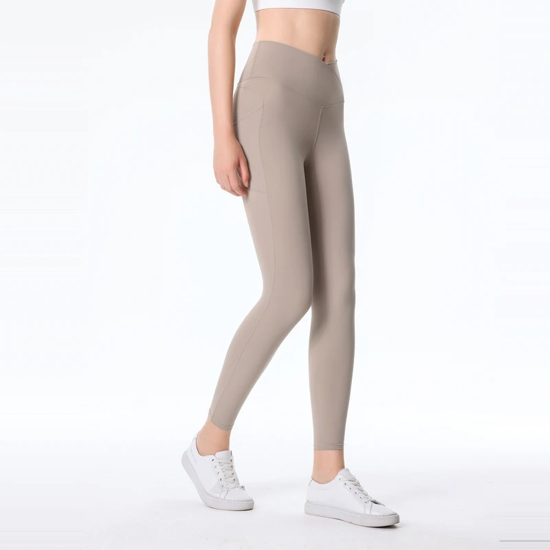 Nowe brzoskwiniowe spodnie do pośladków do jogi damskie ćwiczenia gimnastyczne Push Up ćwiczenia Fitness rozciągliwe legginsy do jogi w jednolitym