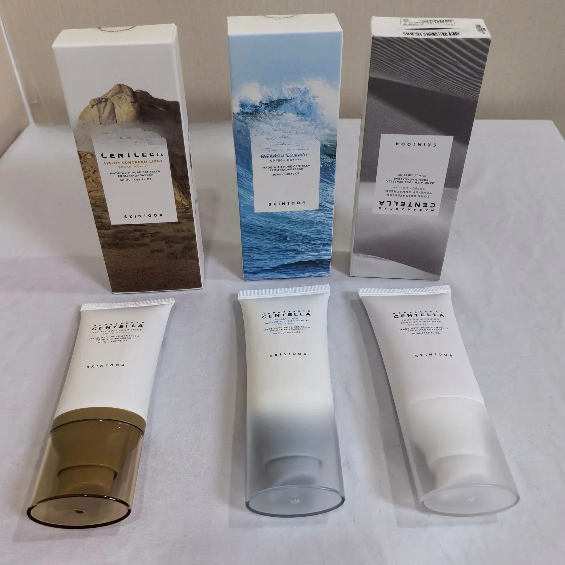 Skin1004 Ácido Hialurónico AIR-FIT SUNCREAM Protector Solar LUZ Protector Solar Facial Protector Solar Corporal SPFSO+ PA++++ 50ml