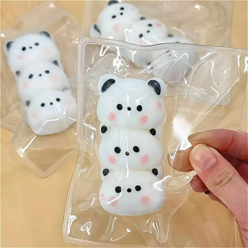

1 Taba Pinch, a new red panda head squeeze toy - never played before. This cute and cute pinch toy uses black and white color scheme and soft touch, can be used as office decoration and photography props, and is also suitable as a gift for Children's