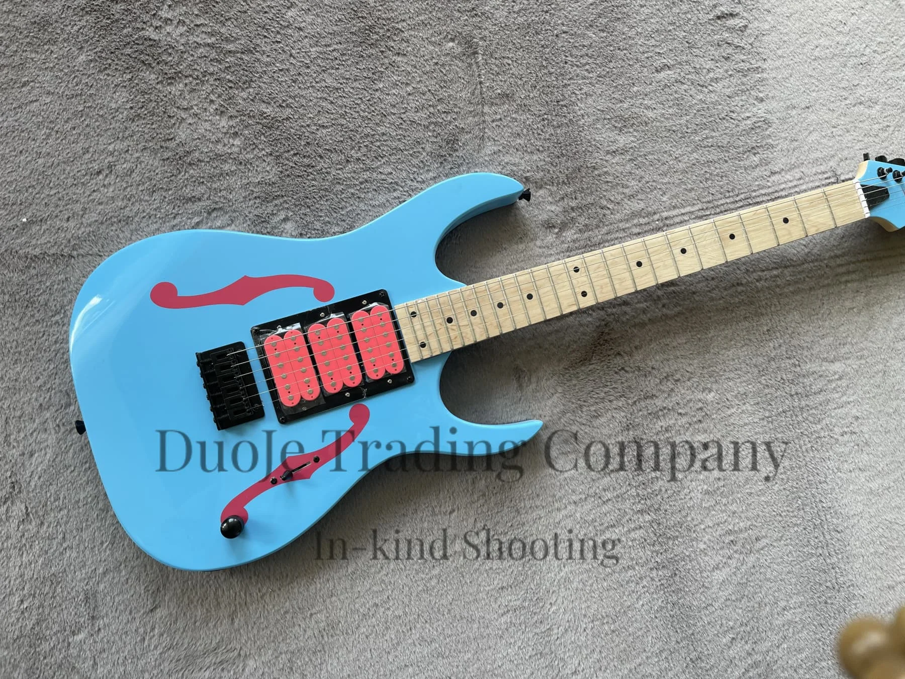 Classic sky blue guitar, printed with f pattern, HHH pink pickup, fixed bridge, solid wood body, maple neck, black tuner