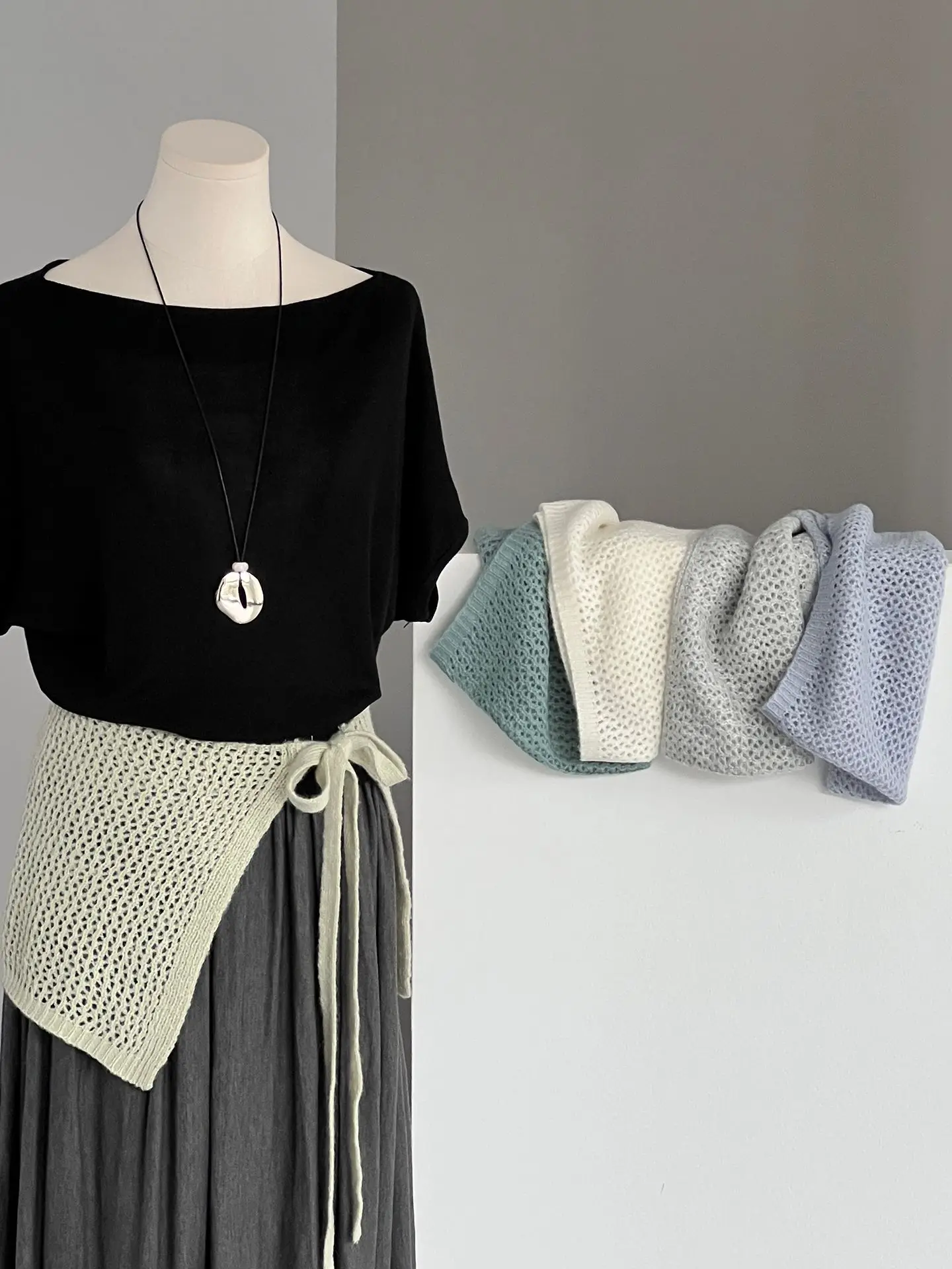 アリススタイリッシュな女性の中空ニットスカートハイウエスト痩身夏白多目的韓国スタイルショルダーショール