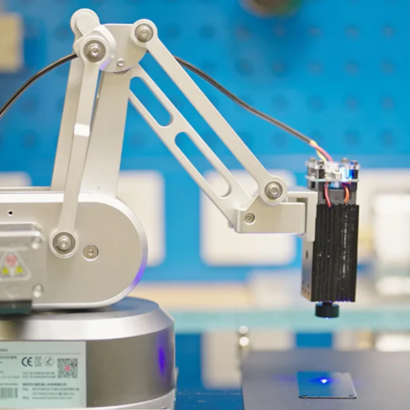 Compact Programmable Robotic Arm with Safety Features for University Labs and Small Batch Production