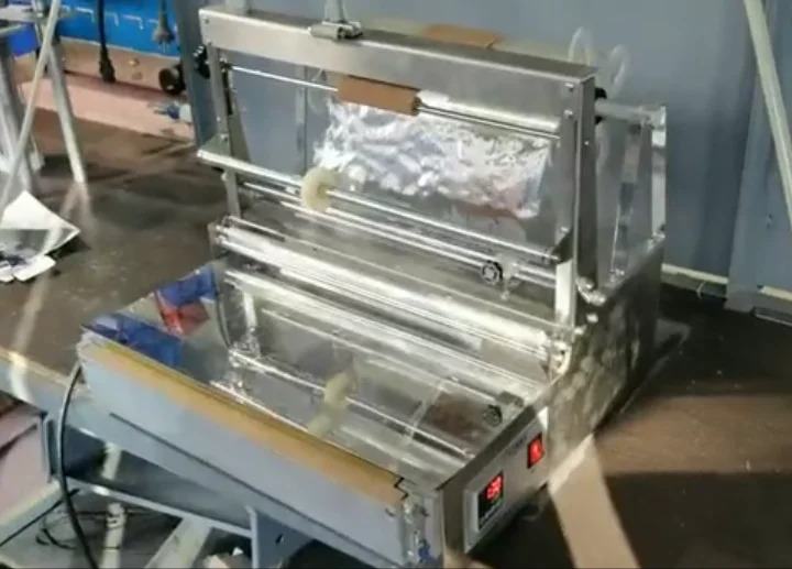 Small automatic cosmetic perfume box 3D film packaging equipment condom cellophane packaging machine