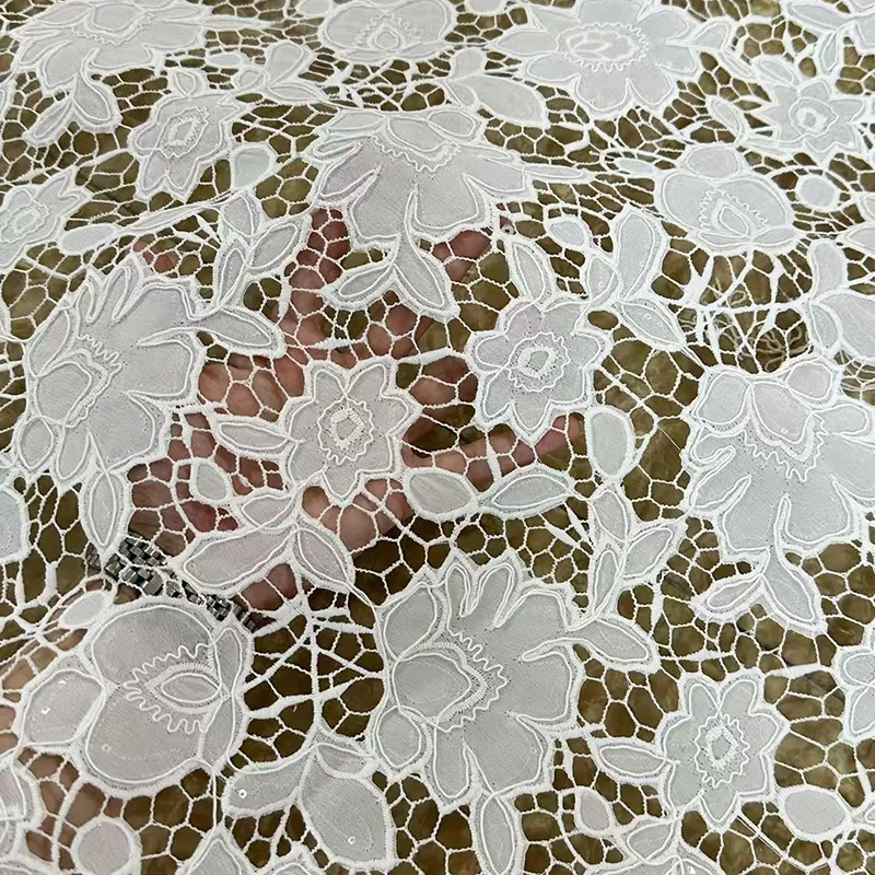 

Latest white African lace fabric with full-width embroidery water-soluble lace trim hollow floral lace fabric for clothing