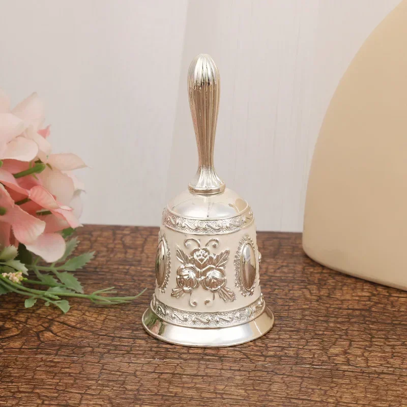 Campana de manivela rosa con manivela manual de aleación de zinc elegante europea a la moda
