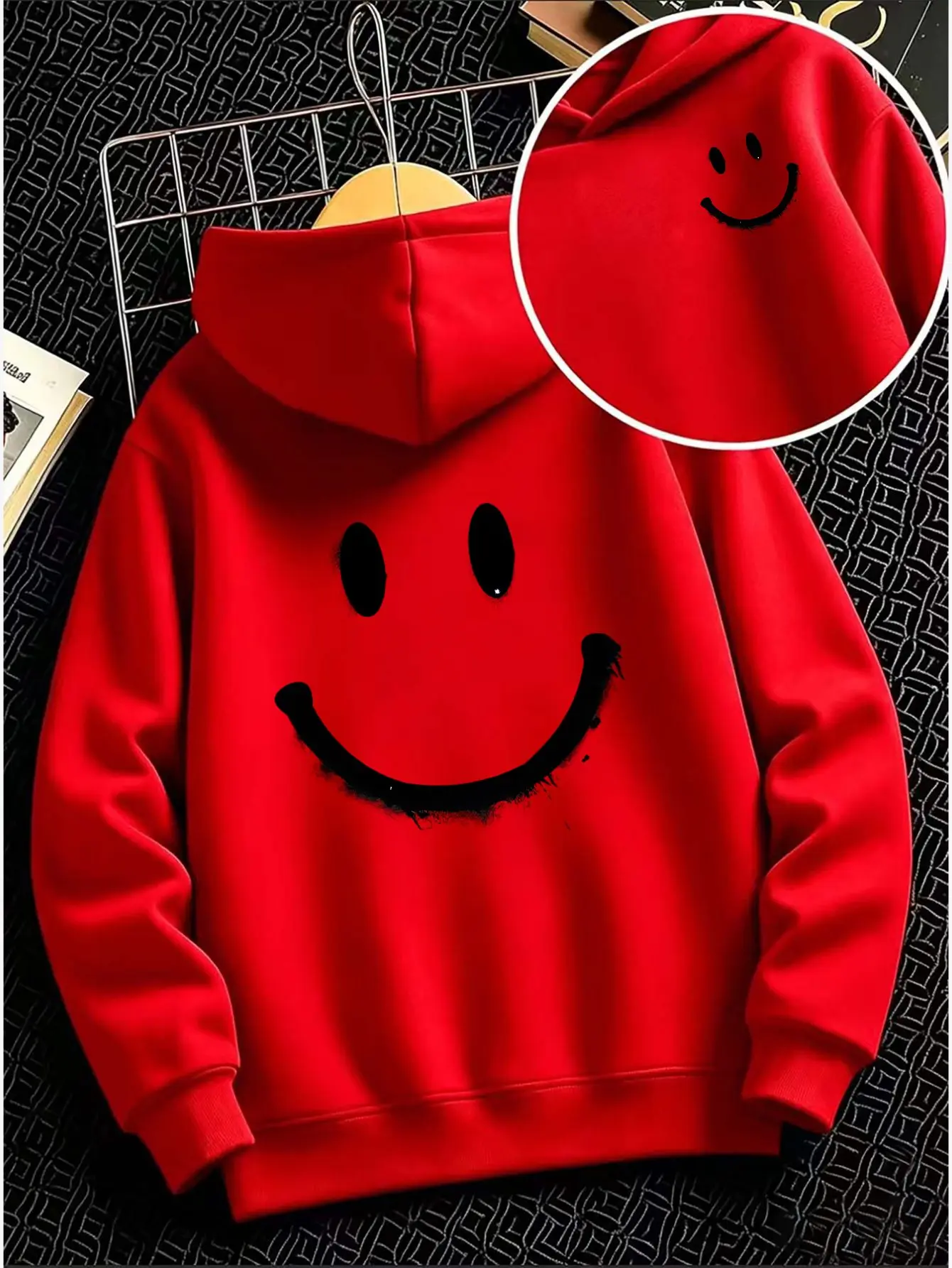 Boys' hoodie, loose and comfortable with a large smiley face print, featuring a shorter front and longer back design.