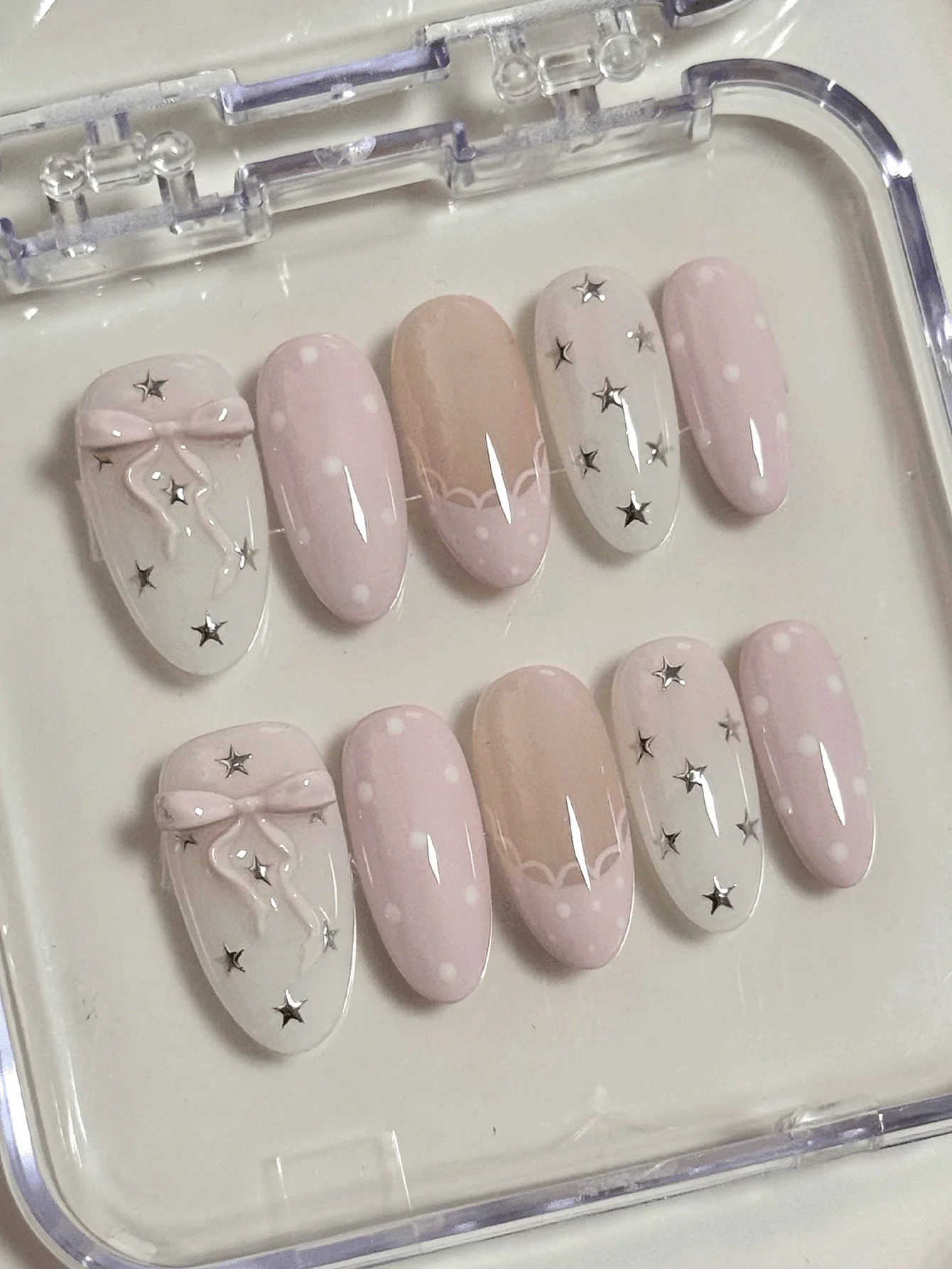 10 Pieces of Oval-Shaped Medium-Length Pink and White Star-Shaped Ballet-Style Press-On Nails, Sweet Ballet Style, Featuring 3D Bow, Stars, and Polka Dots, with Nude Color Contrast and 3D Decoration Techniques, Suitable for Young Girls and Young Women, Perfect for Daily Commuting, Dating, and Birthday Parties, Comes with Jelly Glue and Nail File