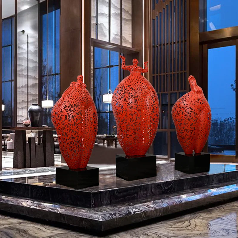 

Hotel lobby, large floor-to-ceiling sculpture, sales office, restaurant entrance, abstract welcome figure ornaments