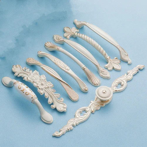 Imagen 2 del producto Tiradores de Zinc para armario, pomos modernos de color blanco marfil para puerta de armario de cocina, pomos de cajón, manija de muebles de moda europea