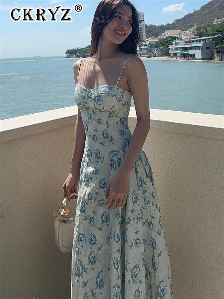 ชุดเดรสยาวลายดอกไม้สำหรับฤดูร้อน แฟชั่นใหม่สำหรับงานเลี้ยงกลางคืน ผู้หญิง แขนกุด เปิดหลัง เหมาะสำหรับวันหยุดพักผ่อน คลับ และสตรีทแวร์