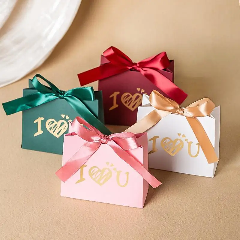 10 Stück Schokoladen-Geschenkverpackungsboxen, geeignet für Hochzeitsbonbons und Valentinstag, Liebesflügel, Goldfolien-Geschenkbox mit Band.