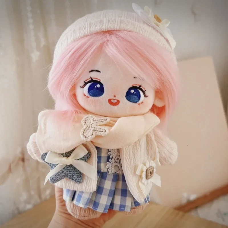 The clothes of the 20 centimeter cotton doll are finely crafted