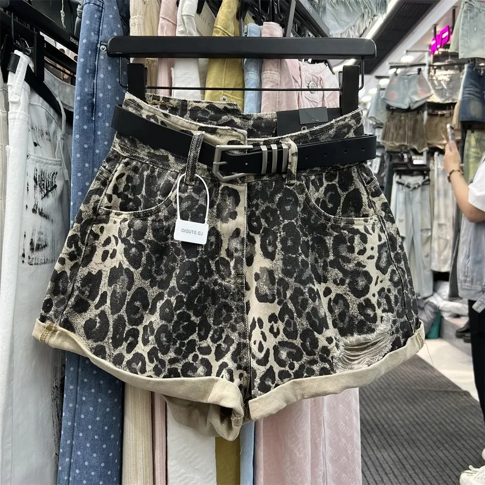 Uniquely designed asymmetrical high waisted  ripped leopard print denim shorts for women in summer, loose