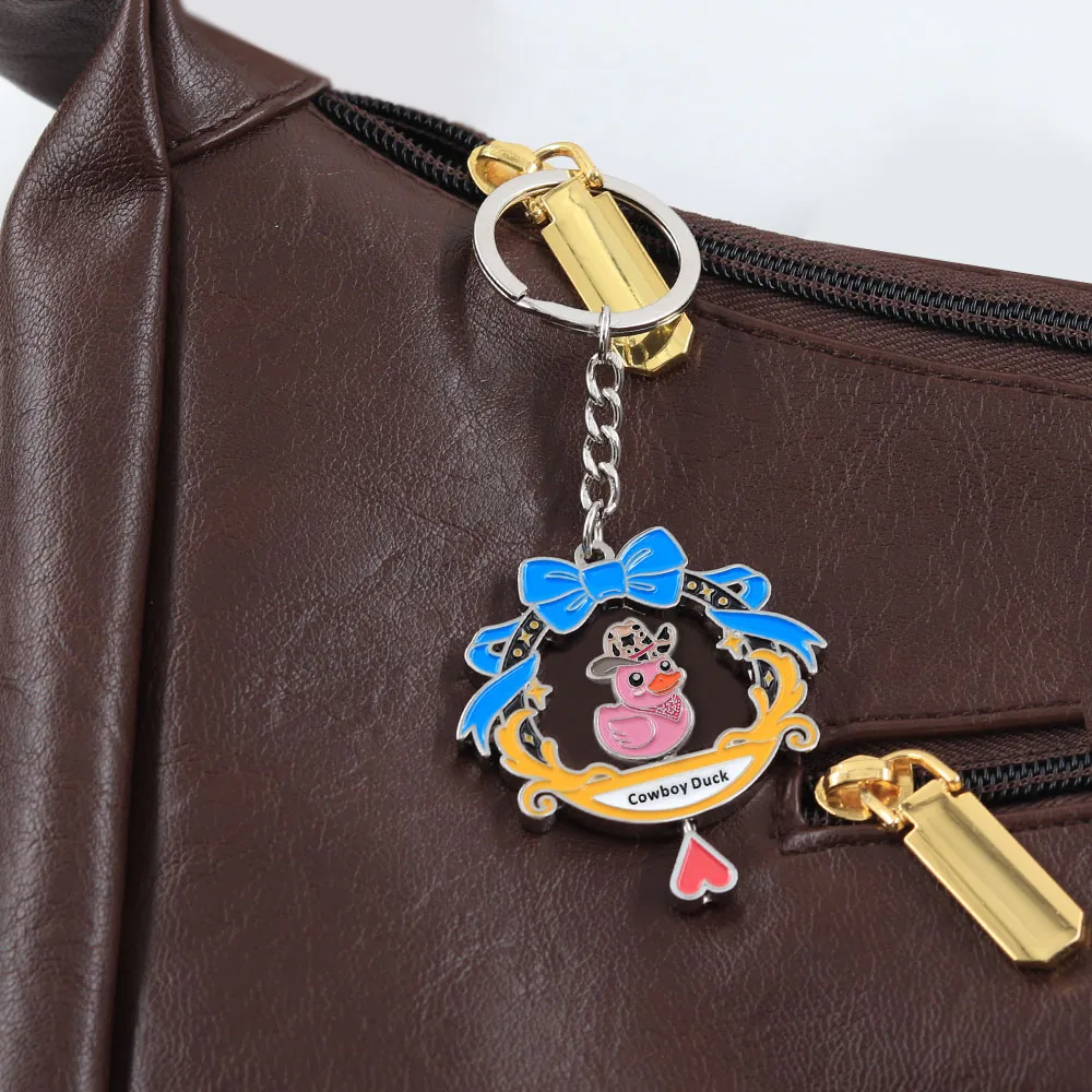 Lustiger rotierender Cowboy-Enten-Schlüsselanhänger, doppelseitig drehbarer rosa Enten-Schlüsselring, Kawaii-Tier-Metallanhänger, Schmuck für Rucksack und Tasche – Detail 6
