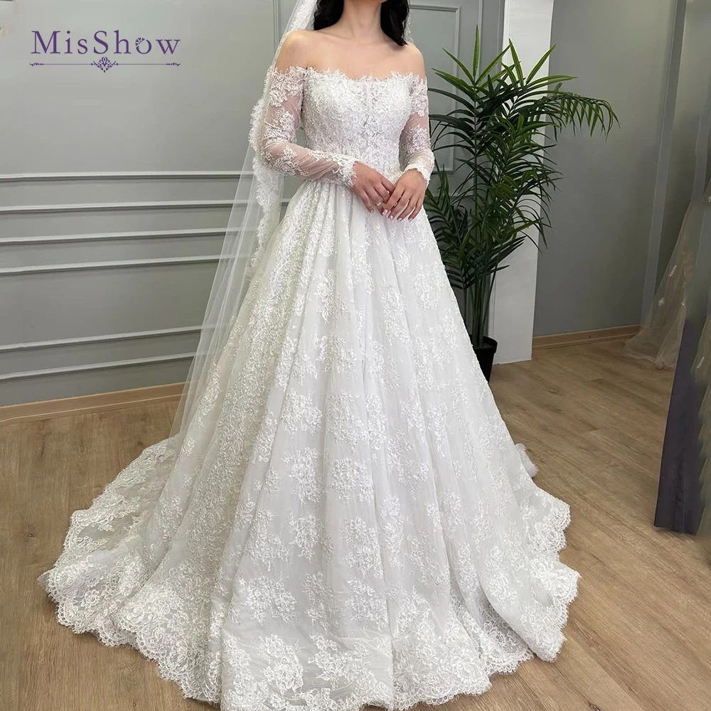 

MisShow Customized Elegant Off-Shoulder Lace Wedding Dresses with Long Sleeves & A-Line Skirt. Exquisite, Fairytale Bridal Gowns