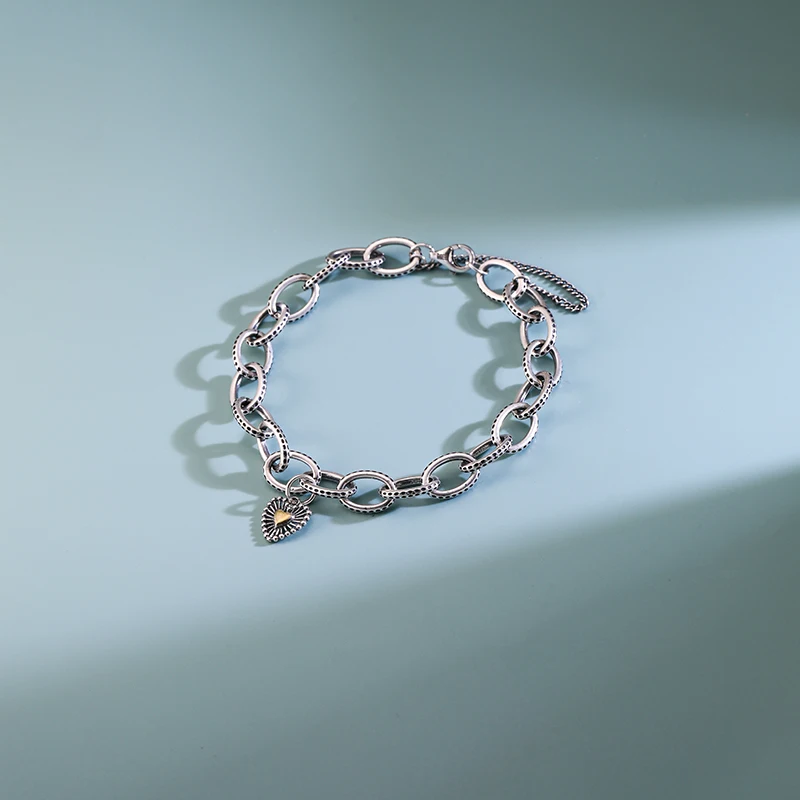 

Genuine 925 sterling silver James Avery Textured Oval Charm Bracelet paired with Heart of Light pendant