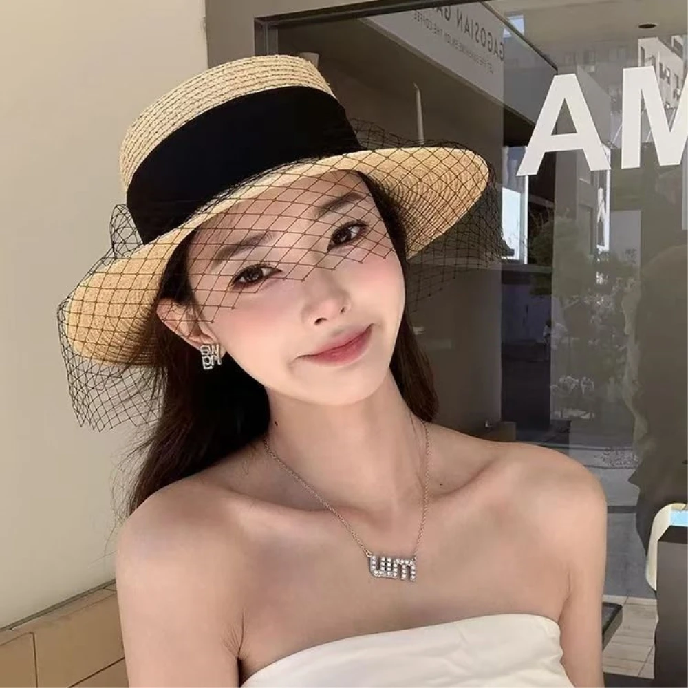 

2024 New year Lafite Grass Flat Top Straw Hat Women's Summer Korean Edition Fashion Retro Mesh Bow Beach Vacation Sunscreen Hat