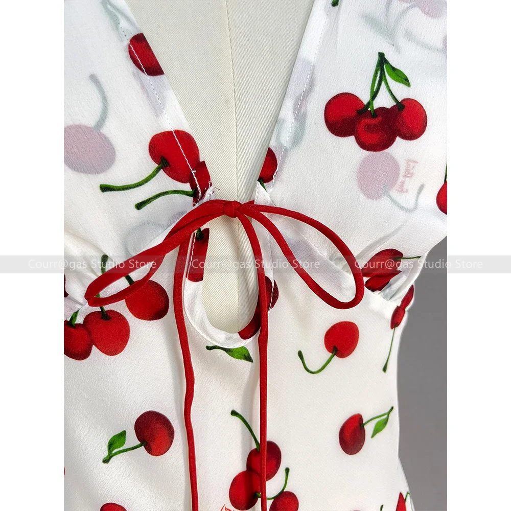 French niche fashion hottie sleeveless white V-neck silk cherry dress short female