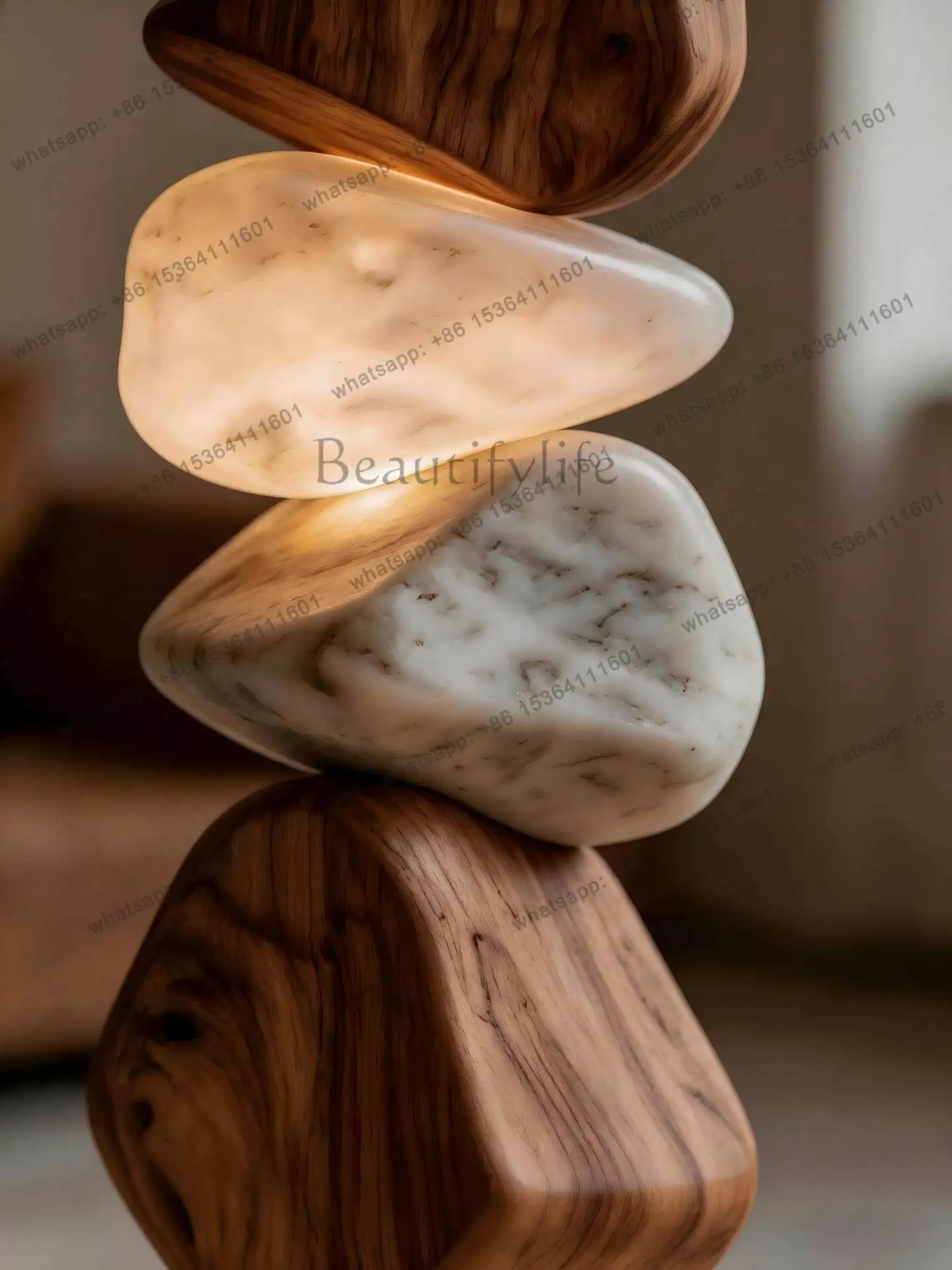 Floor-to-ceiling luminous ornament next to the sofa in the of wabi wind designer creative stacked stone decorative ornament