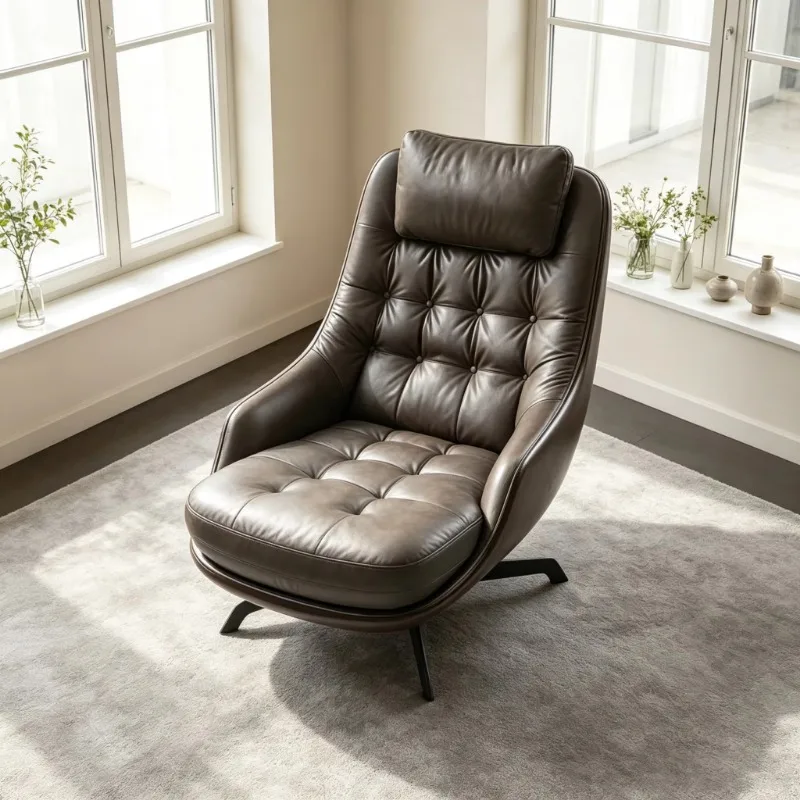 Modern luxury leather tufted lounge chair with rotating function and headrest, metal base, suitable for living rooms and hotels