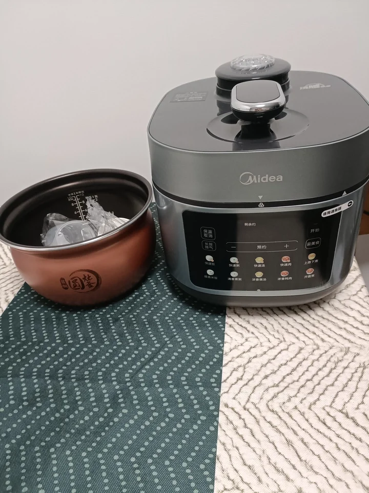 Midea electric pressure cooker household 5L large capacity 0 coating stainless steel double bile multi-functional intelligent
