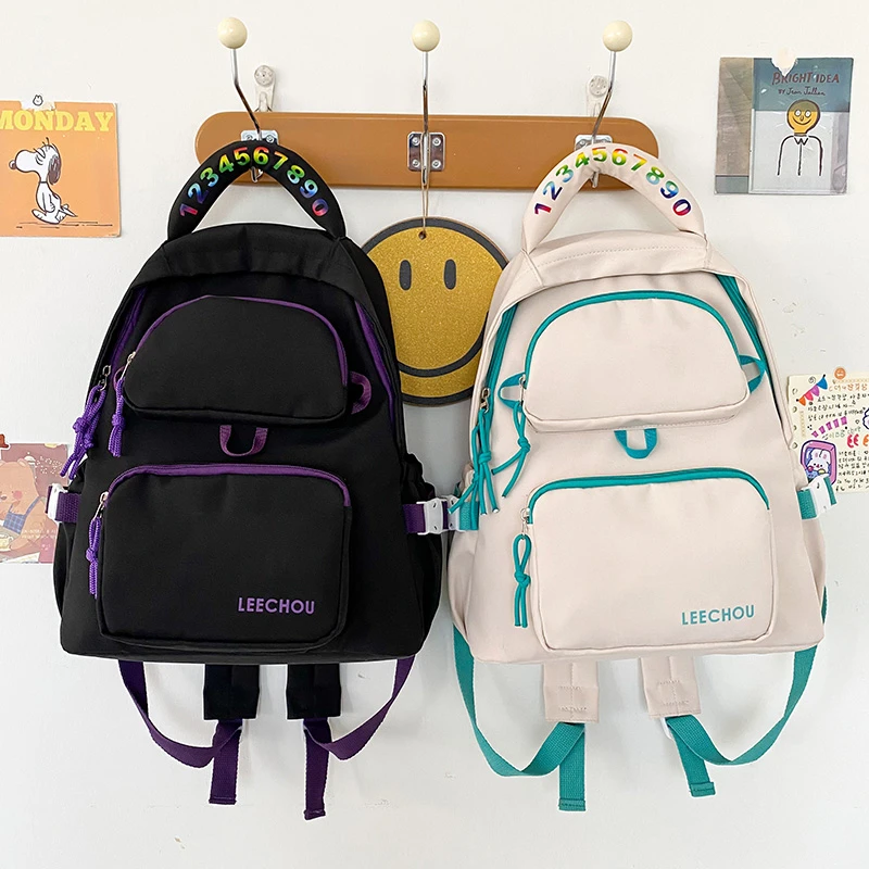 Kobieta plecak na laptopa damskie Kawaii słodkie damskie tornistry modne nylonowe wodoodporne kolorowe numery podróżne bookbag Teen sac Girls