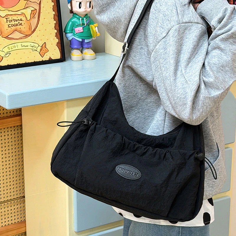 

Korean Style Ins Minimalist Casual Dumpling Bag Women 2026 Summer New Single Shoulder Crossbody Bag Versatile Student Canvas Bag