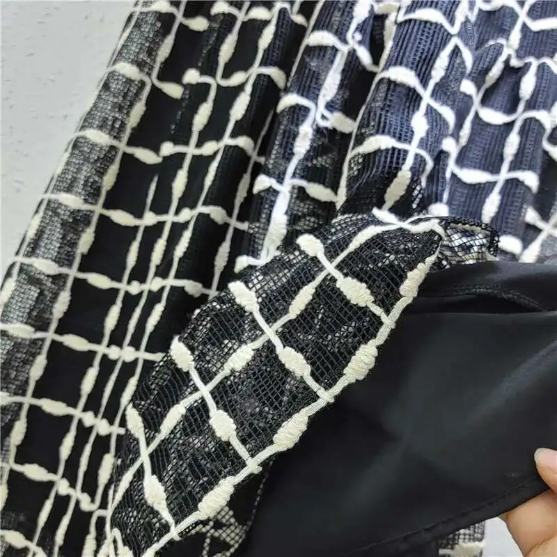 Maille crochet creux fleur grille conception Style jupe tempérament fée tout-match robe pour les femmes printemps nouvelle marée