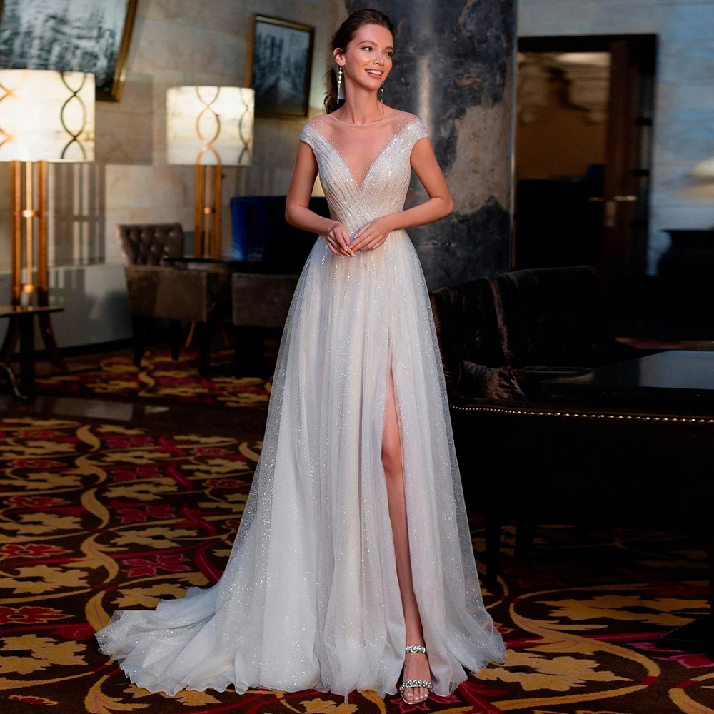 Sparkling Tulle Side Slit Wedding Dress Elegant Cap Sleeves Sheer O-Neck Bridal Gowns Customized Sequined A-Line Bridal Dress