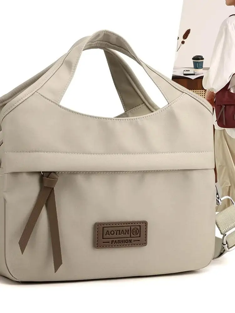 

Новая корейская водонепроницаемая нейлоновая сумка через плечо, женская модная сумка на одно плечо, универсальная, прочная, для ежедневного использования