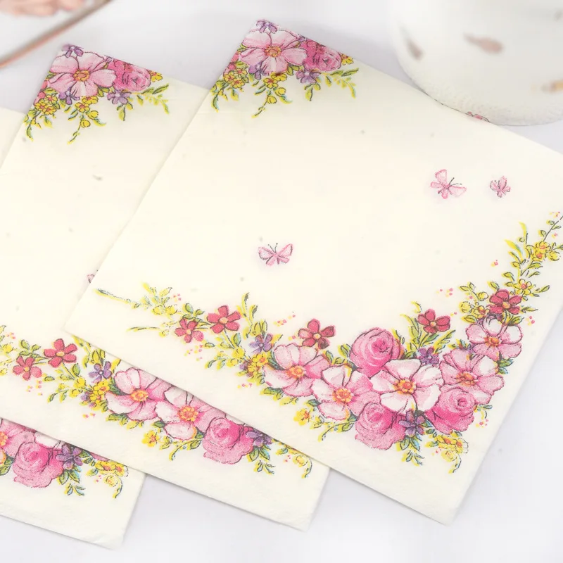 Diagonal flower printed napkin, pink meal pad paper, wine cup flower arrangement surface, disposable napkin paper