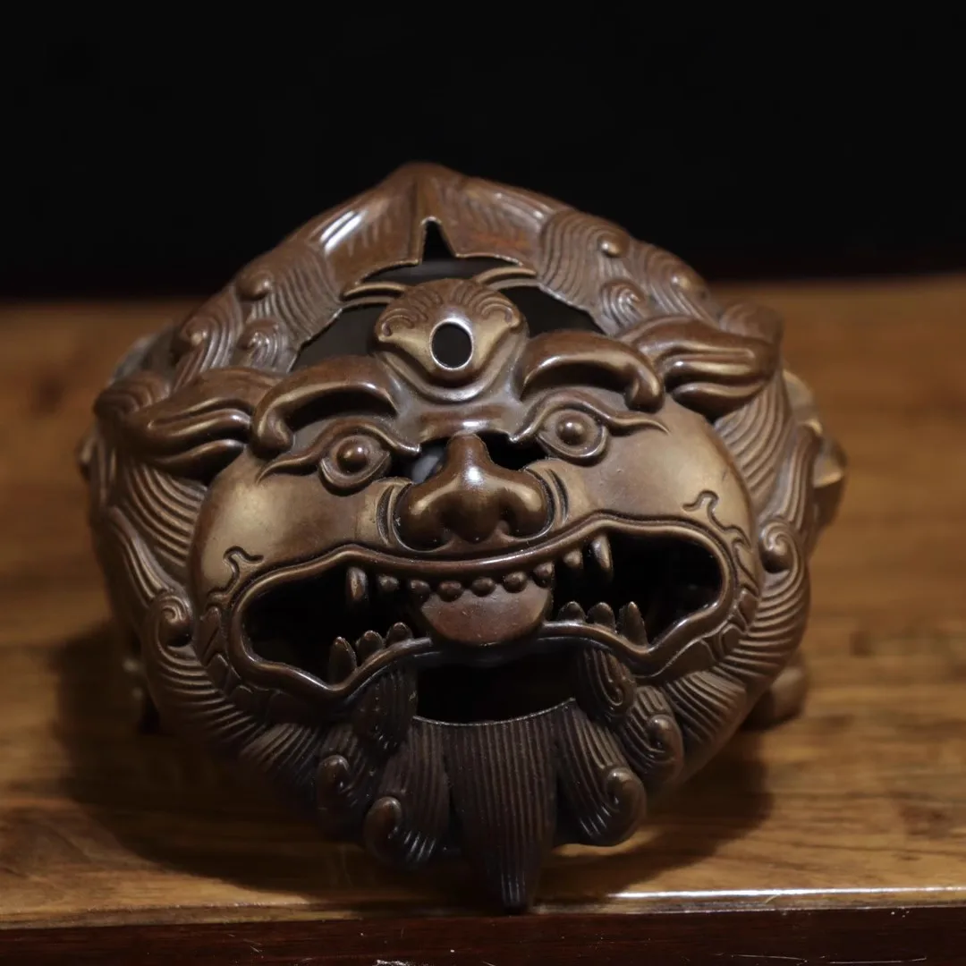 The copper incense burner, shaped like a mythical beast Suan Ni, measures approximately 10 cm in length, 9 cm in height,