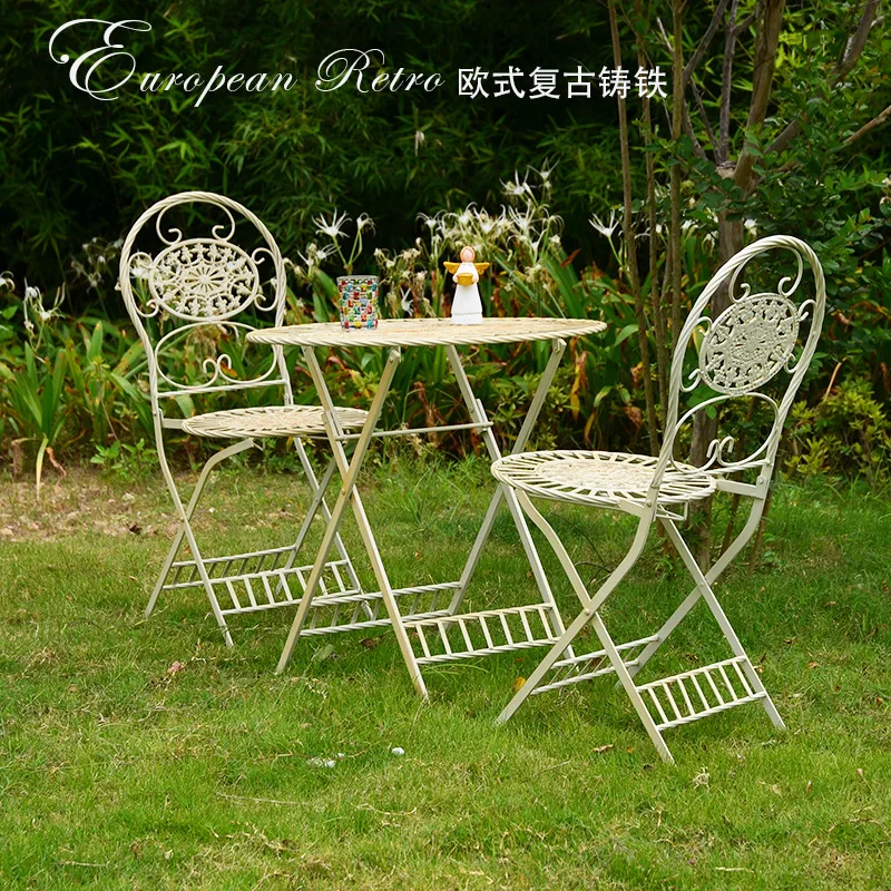 European cast iron high-end tables and chairs foldable wrought iron retro old outdoor garden balcony tables and chairs