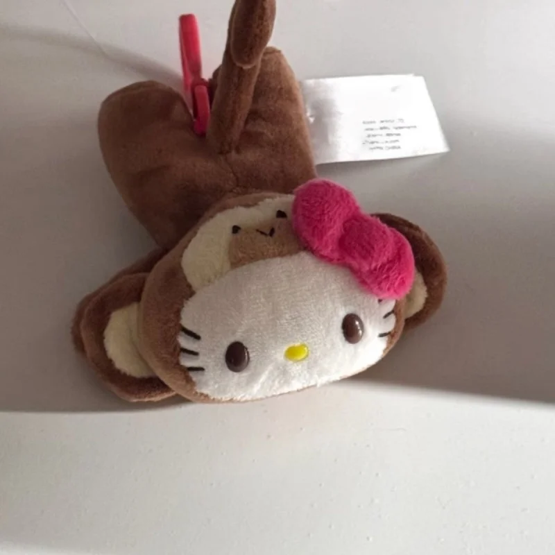 Lindo bosque tropical serie pequeño mono Hello Kitty juguete de peluche llavero creativo mono muñeca divertido Kittycat peluche