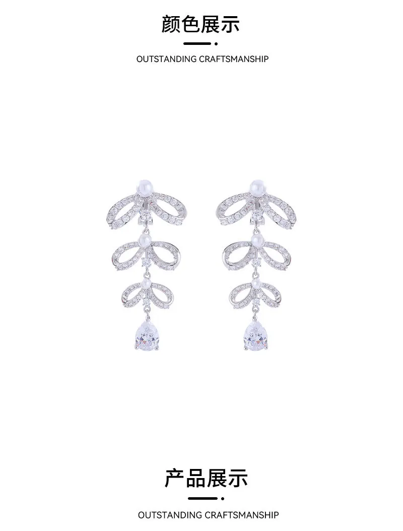 Комплект циркониевых серег с жемчугом-бантом, без пирсинга ушей, зажимами для ушей и кисточками.