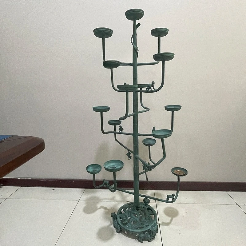 Reproduction of antique bronze candle holders with continuous lamps, wedding and film props