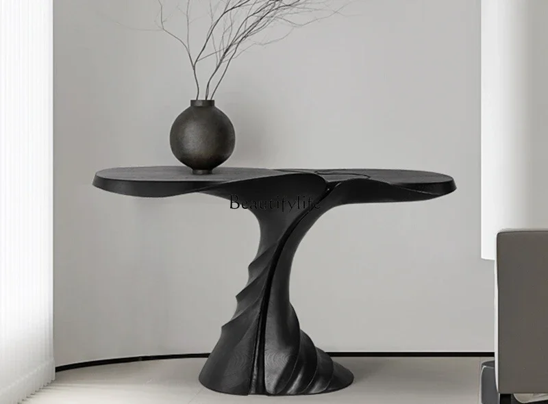 

88.All solid wood entrance table decorated against the wall in the aisle