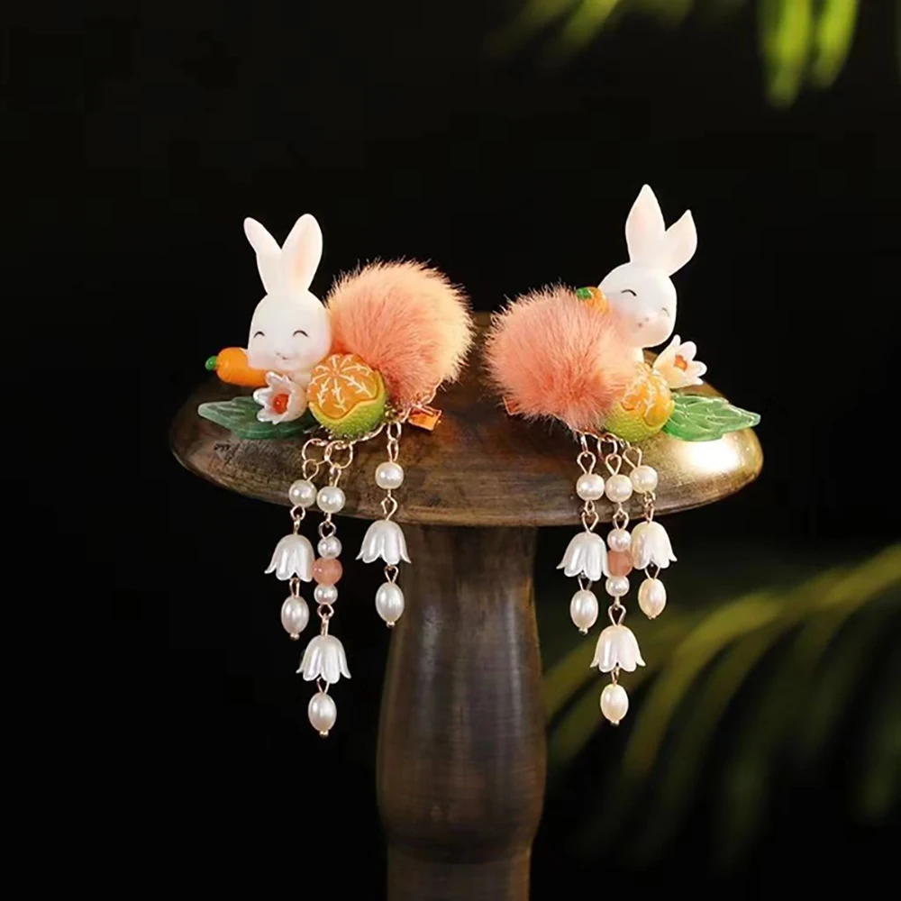 2024 autumn new Hanfu headwear, furry ball hair clip, girls' super fairy tassel ancient style hair accessory, rabbit new year