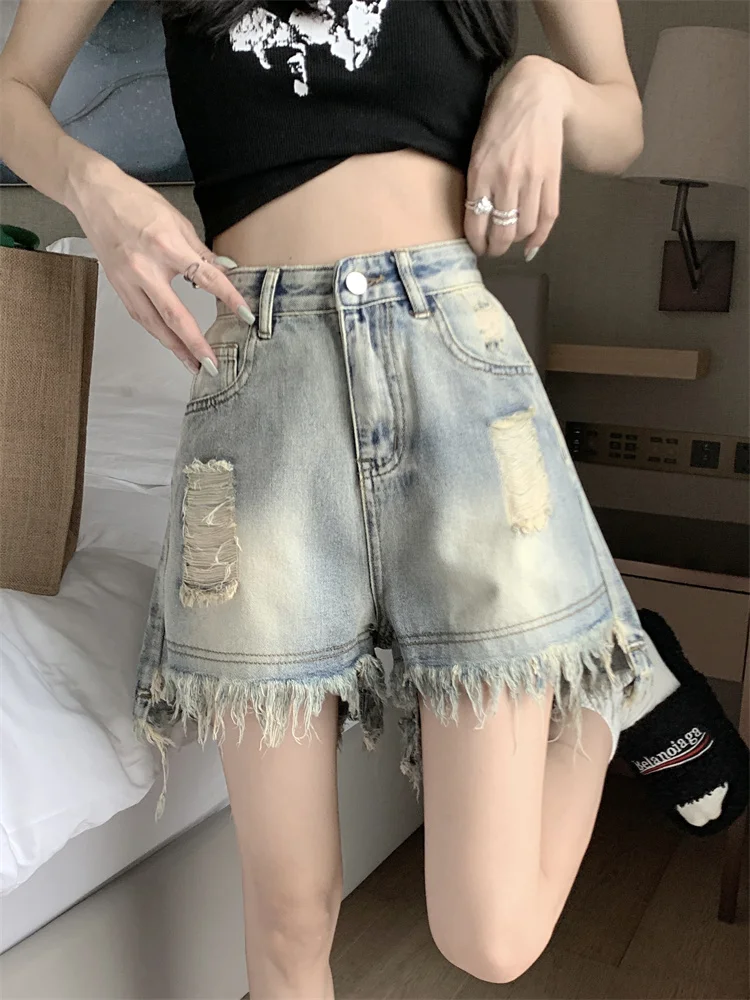 Pantalones vaqueros Retro destridos de cintura alta para mujer, diseño de talla grande con agujero, dobladillo deshilachado, pantalones picantes de cintura alta para primavera y verano