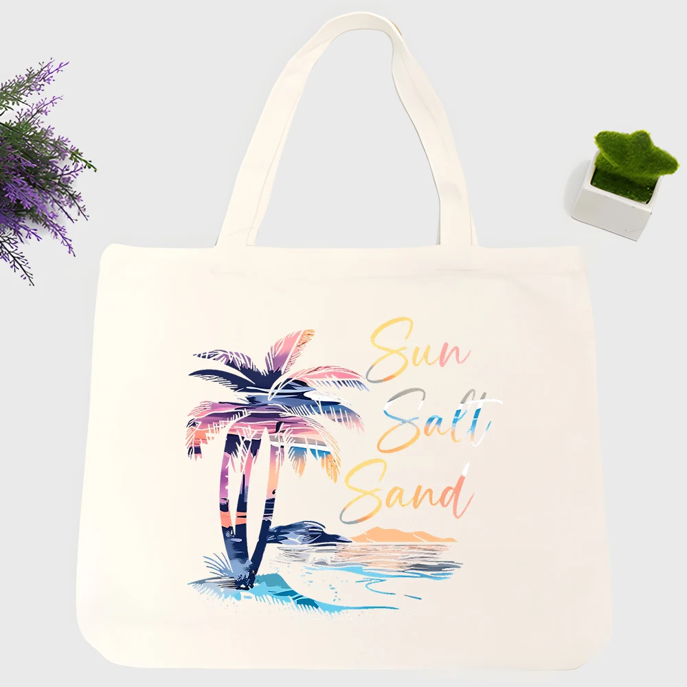 Women's palm tree and sunset print canvas tote bag, artistic design for beach and summer outings