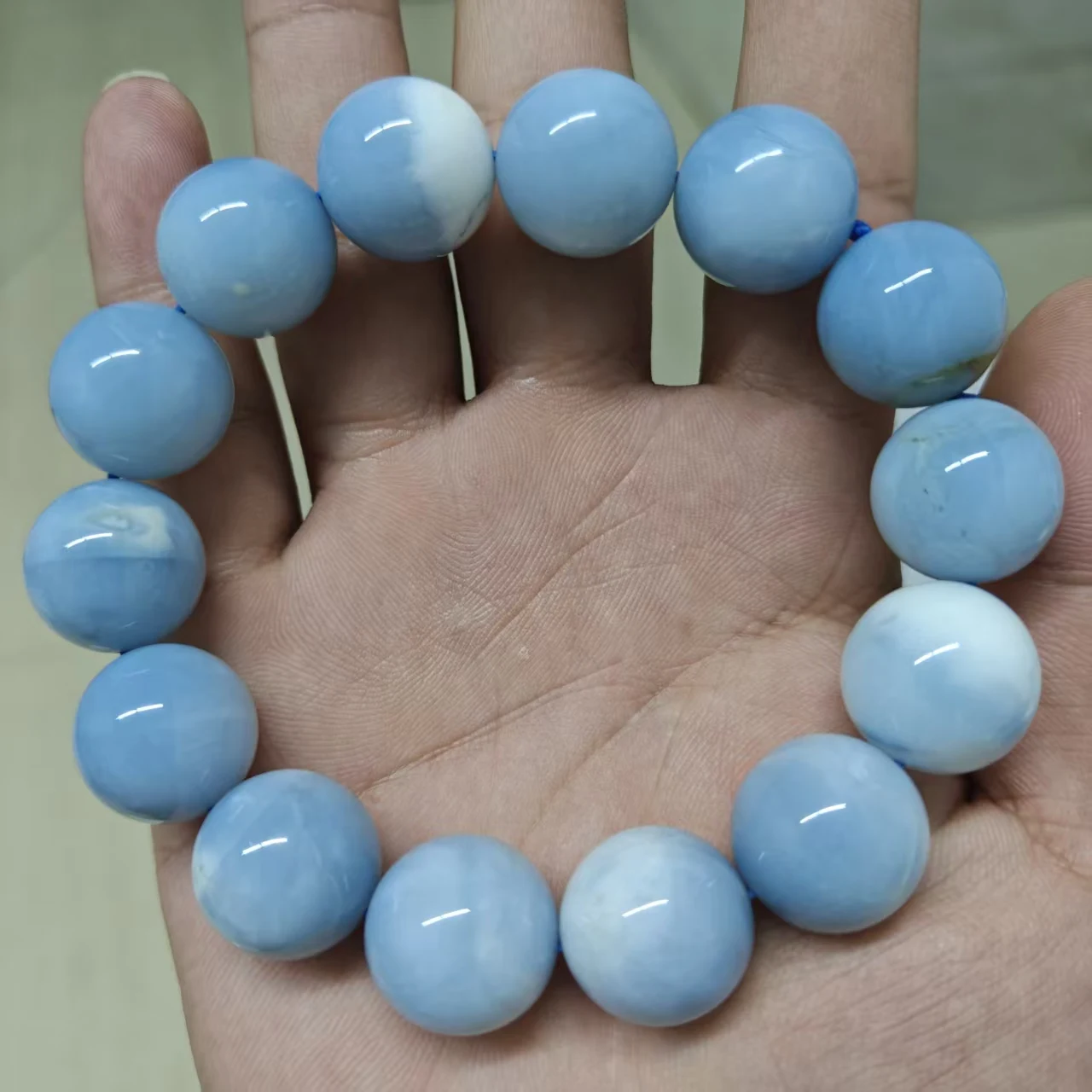 Xingyu Großhandel Natürliche Schöne Glückssteine Top Blauer Opal Glatte Runde Perlen für Schmuckherstellung Design DIY Armband Geschenk – Detail 3