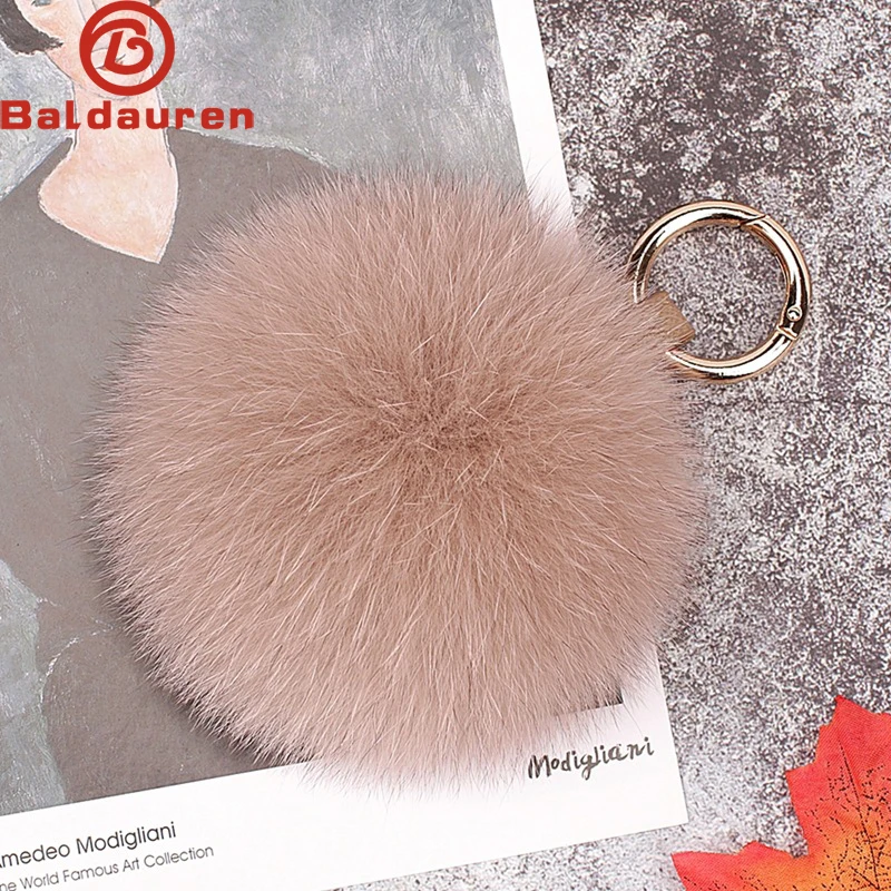 

2024 Real Fox Fur Keychain Natural Fur Pompom Ball Women Bag ornaments Pendant Luxury Car Key Ring Leather Strap Metal Ring Gift