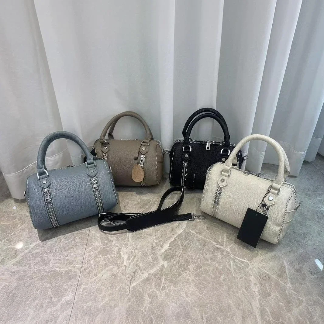 

2025 Новая модная сумка-ведро из воловьей кожи с узором личи, текстурированная модель фурнитуры, портативная сумка с наклоном