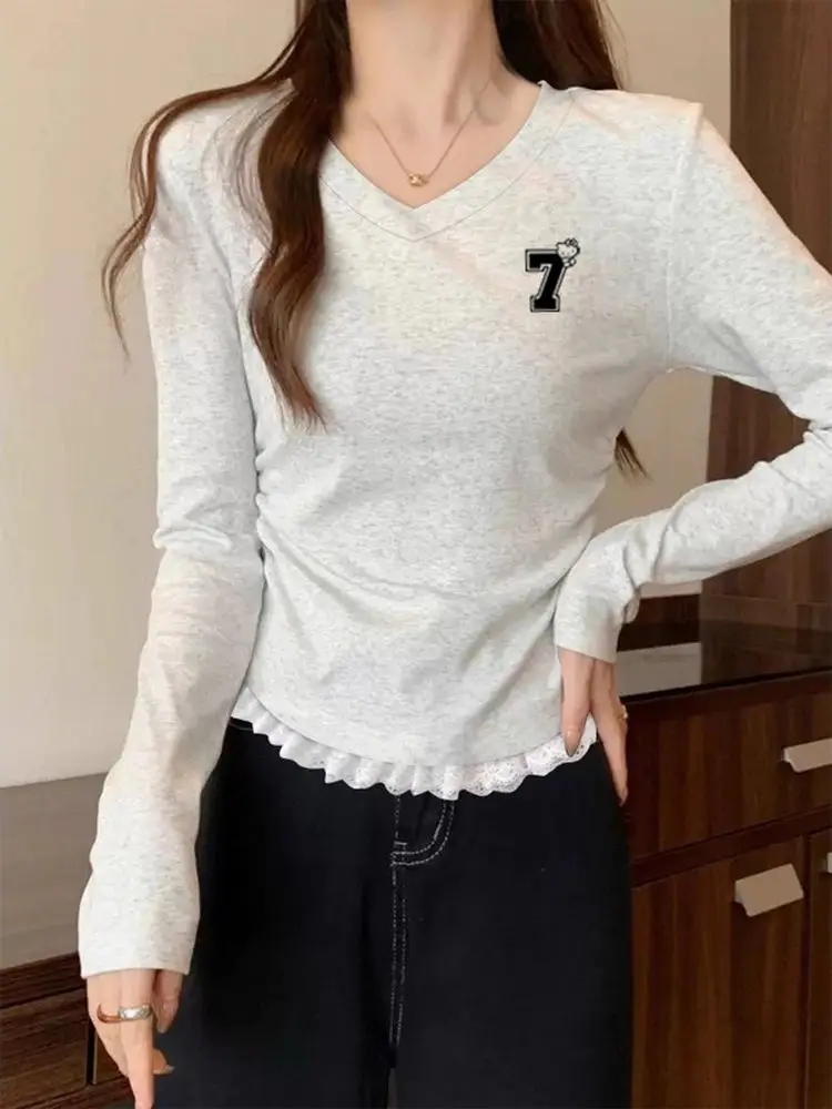 تي شيرت نسائي فريد من نوعه جميل مزين بالدانتيل طويل Sve بقصة ضيقة ومتعدد الاستخدامات أوائل الخريف وخصر عالٍ على شكل حرف V ناعم ومريح... #1