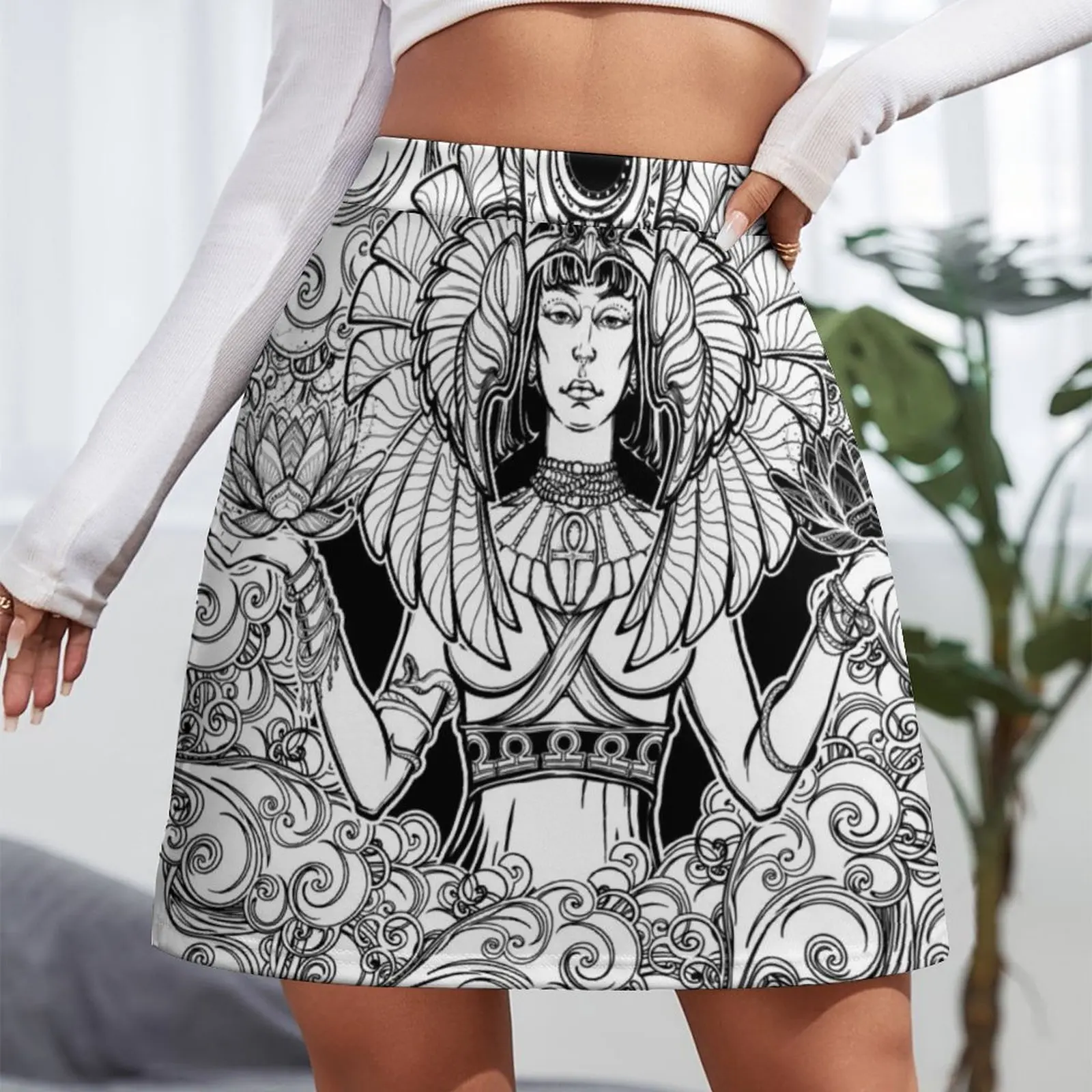 Zodiac sign Libra. Egyptian goddess Isis balancing in hands black and white lotus as a symbol of equilibrium. Decorat Mini Skirt