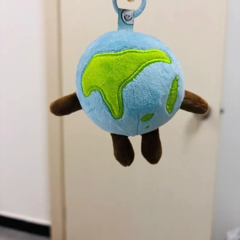 Super Cute Earth Keychain - 3.94 Inches (1.57 Inches Diameter), Soft Plush Pendant with A Smiling Face and Green Continent, Sturdy Bag Pendant for Backpacks, Purses and Keys - Perfect for Unique Travelers and Nature Lovers - Detail 1
