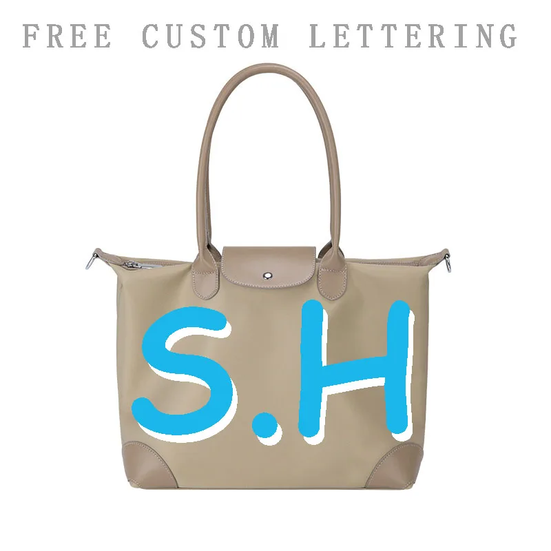 

Free customized personalized signature nylon travel computer bag 2025 new niche design large capacity fashionable hand tote bag