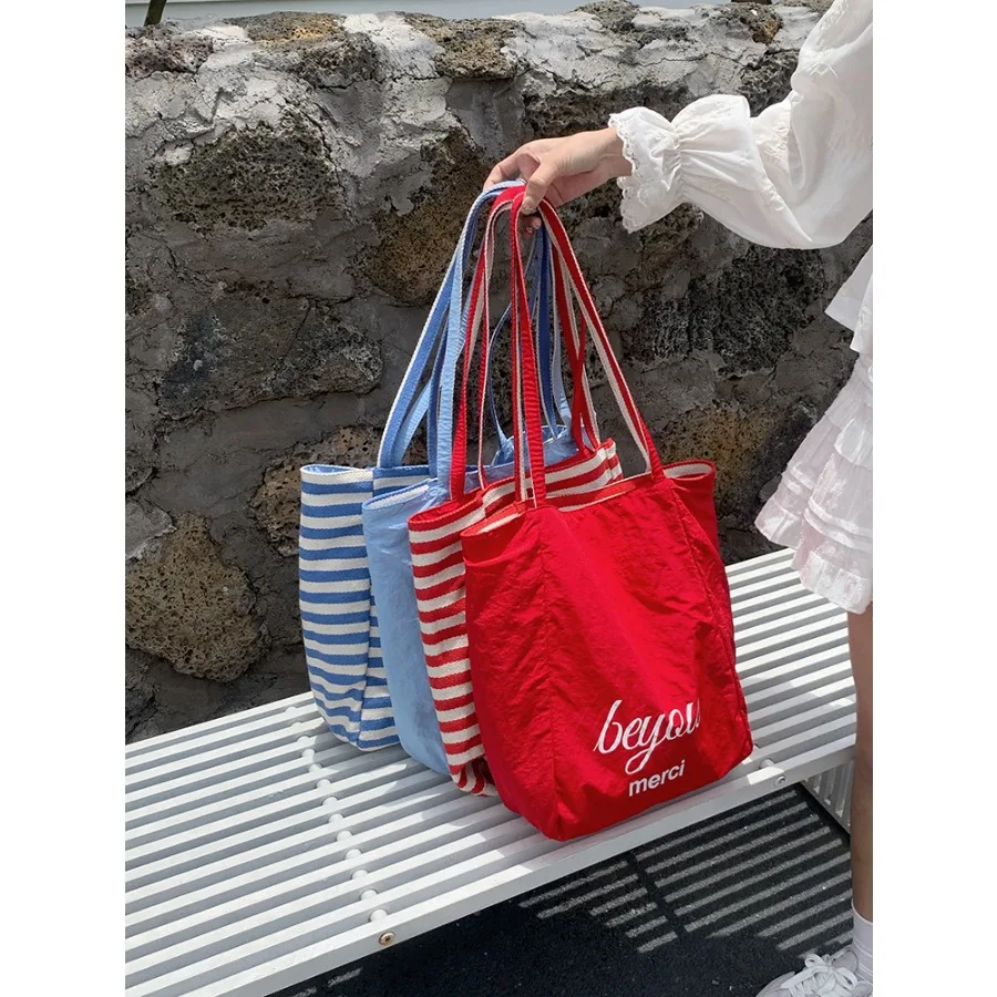 

Double-sided striped canvas bag Korean ins lazy wind large capacity shoulder tote bag student casual shopping bag female